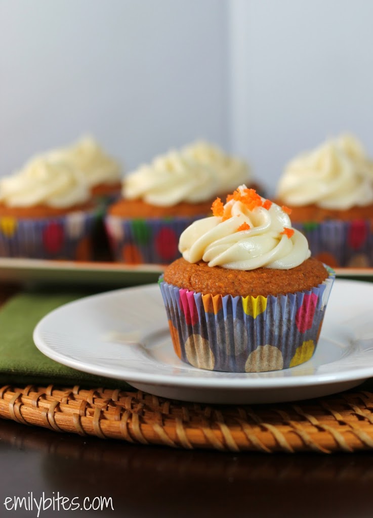 Cupcake Muffins with Cream and Decoration Carrot Cake on Table