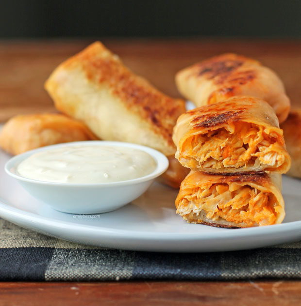 Buffalo Chicken Egg Rolls stacked on a plate