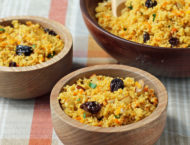 Couscous with Raisins and Almonds in bowls