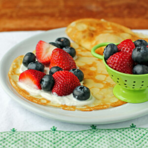 Crepes with Yogurt and Berries on a plate