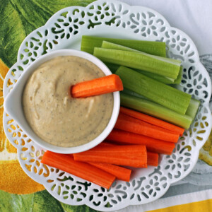 Lemon Garlic Hummus with carrots and celery overhead