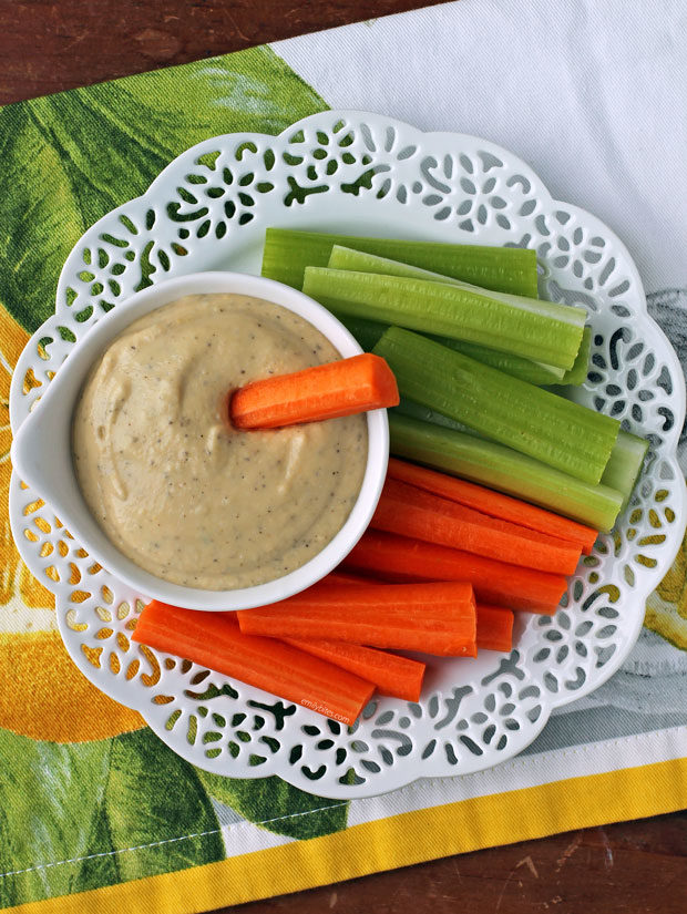 Lemon Garlic Hummus with carrots and celery overhead