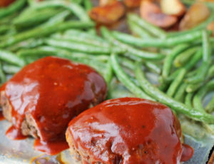 Sheet Pan Meatloaves with Roasted Potatoes and Green Beans on the pan