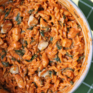 One-Pot Creamy Tomato Pasta with Chicken and Spinach in a pot