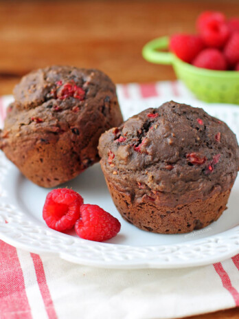 Two Chocolate Raspberry Muffins on a plate
