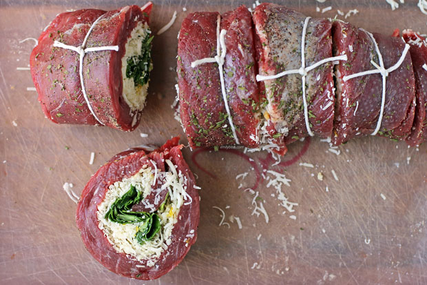 Garlic Parmesan Flank Steak Pinwheels sliced before cooking