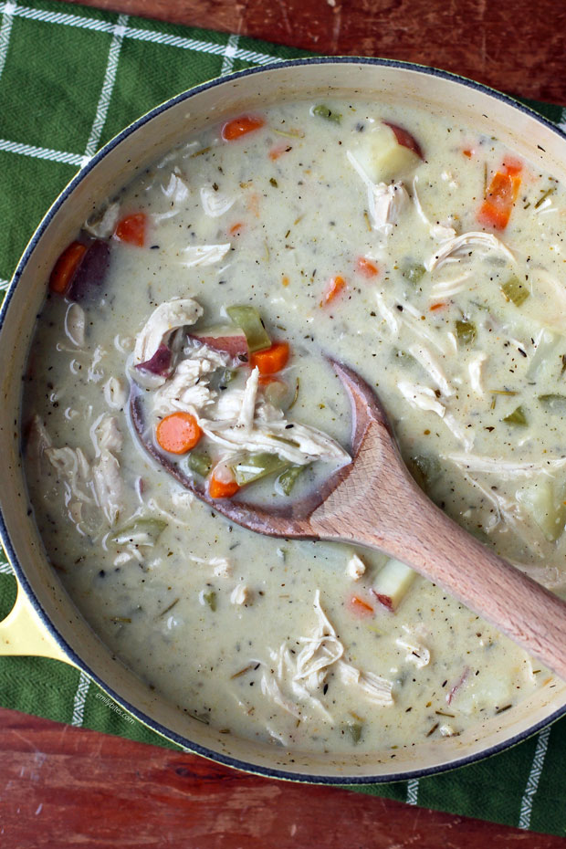 Creamy Chicken Stew in the pot with a spoon