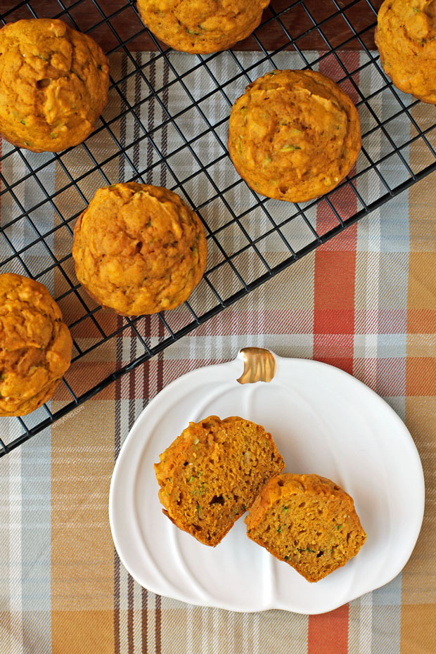 Pumpkin Zucchini Muffin cut open on a plate