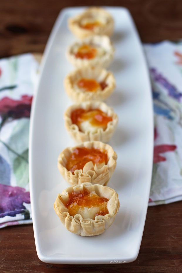 Apricot Brie Tartlets lined up on a platter
