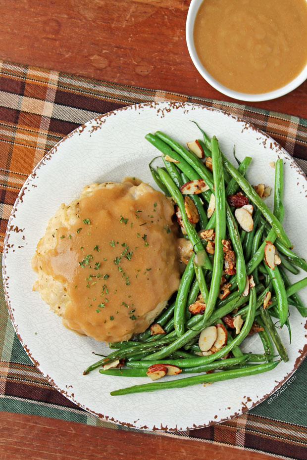 Green Beans with Almonds plated with Stuffed Turkey Bundles