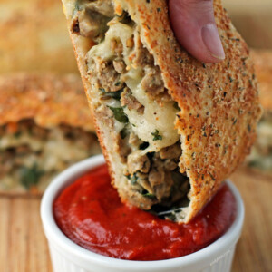 Italian Sausage Bread dipped in sauce