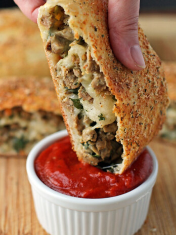 Italian Sausage Bread dipped in sauce
