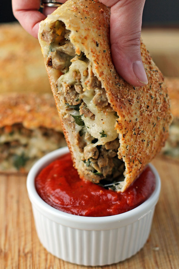 Italian Sausage Bread dipped in sauce