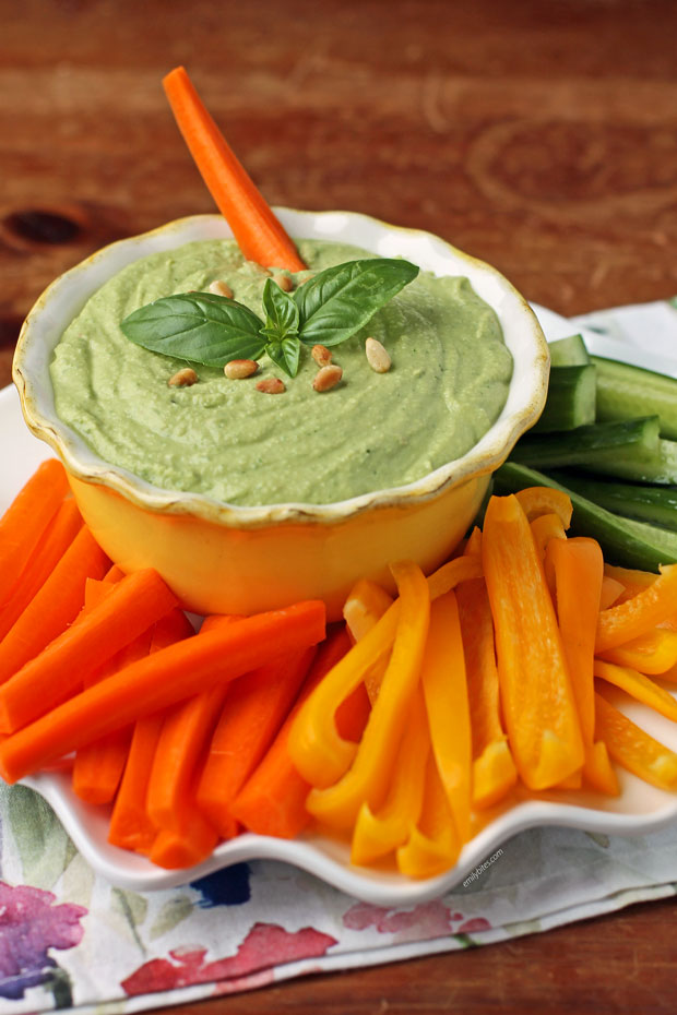 Basil Hummus in a bowl with veggies