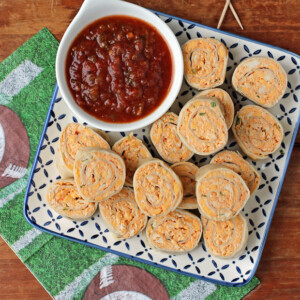 Chicken Taco Tortilla Pinwheels served with salsa