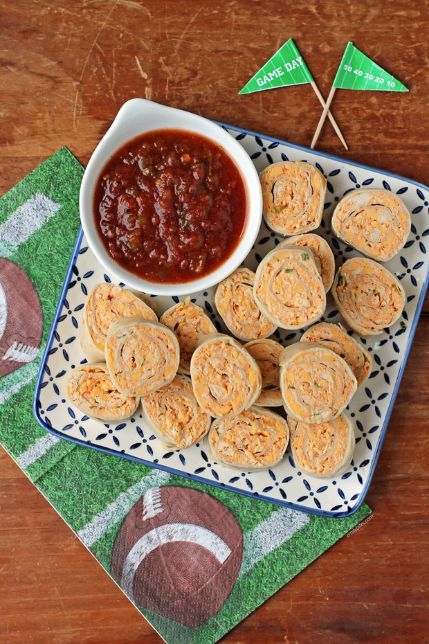 Chicken Taco Tortilla Pinwheels served with salsa