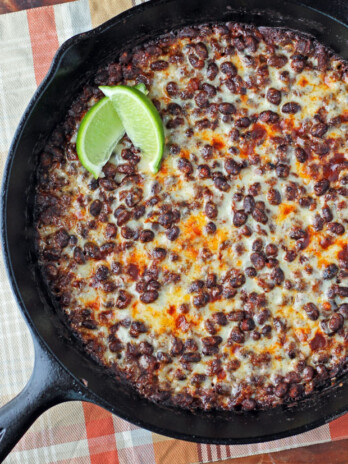 Cheesy Spicy Black Bean Skillet with lime