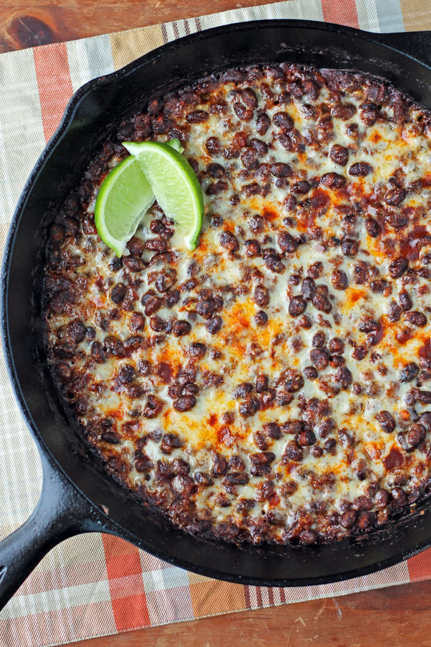Cheesy Spicy Black Bean Skillet with lime