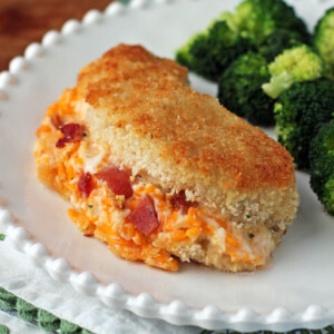 Cheesy Bacon Ranch Stuffed Chicken on a plate with broccoli