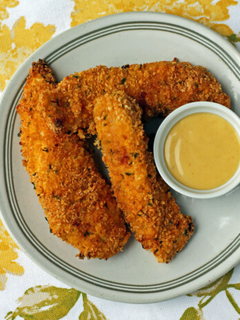 Honey Mustard Chicken Tenders on a plate with sauce