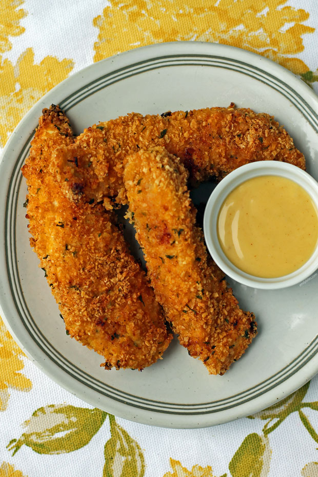 Honey Mustard Chicken Tenders on a plate with sauce