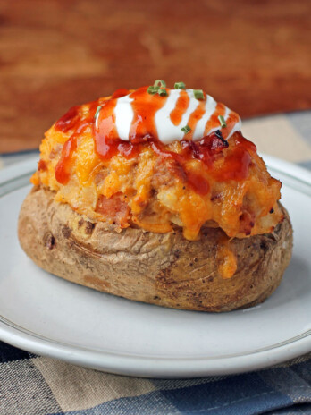 Loaded BBQ Stuffed Twice Baked Potatoes with toppings