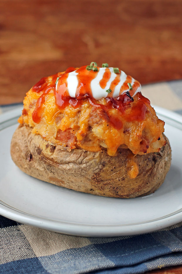 Loaded BBQ Stuffed Twice Baked Potatoes with toppings