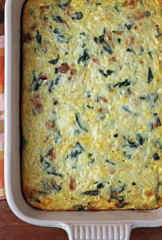 Bacon and Spinach Hash Brown Egg Bake close up in baking dish