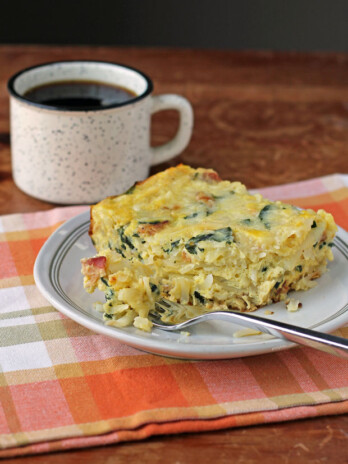 Bacon and Spinach Hash Brown Egg Bake with a forkful