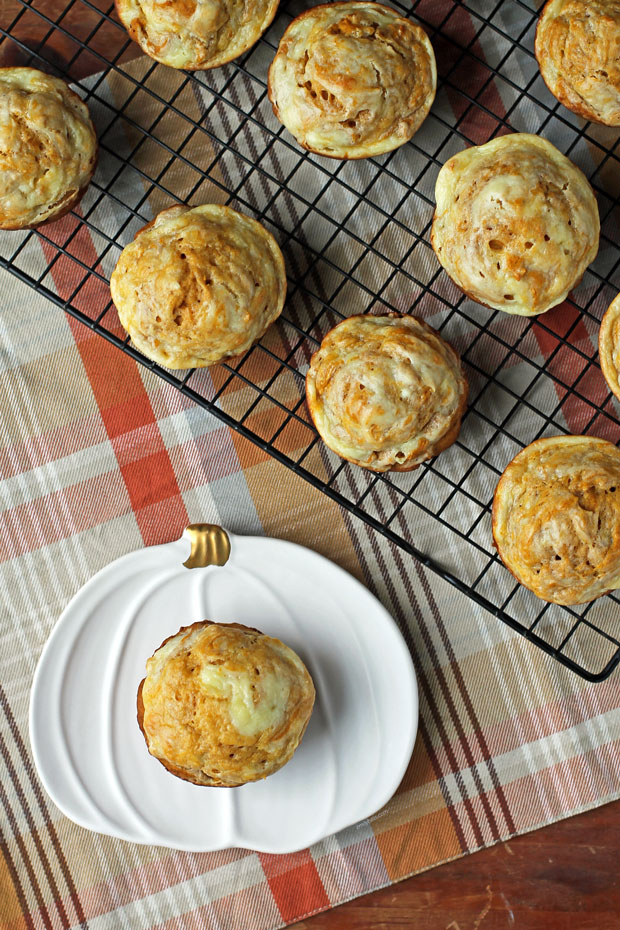 Pumpkin Cream Cheese Swirl Muffin on a pumpkin plate