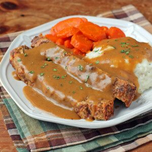Louisiana Meatloaf with Cajun Gravy, mashed potatoes, and carrots