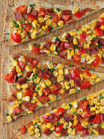Bacon, Corn and Tomato Flatbread close up on cutting board