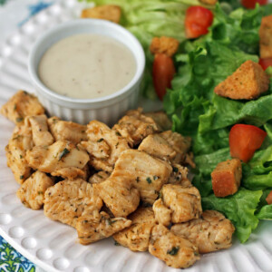 Pickle Brined Chicken Bites on a plate with ranch