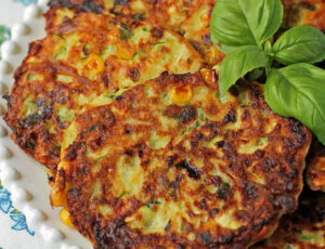 Zucchini Corn Fritter close up on a platter