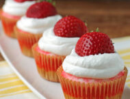 Strawberry Jell-O Poke Cupcakes in a row