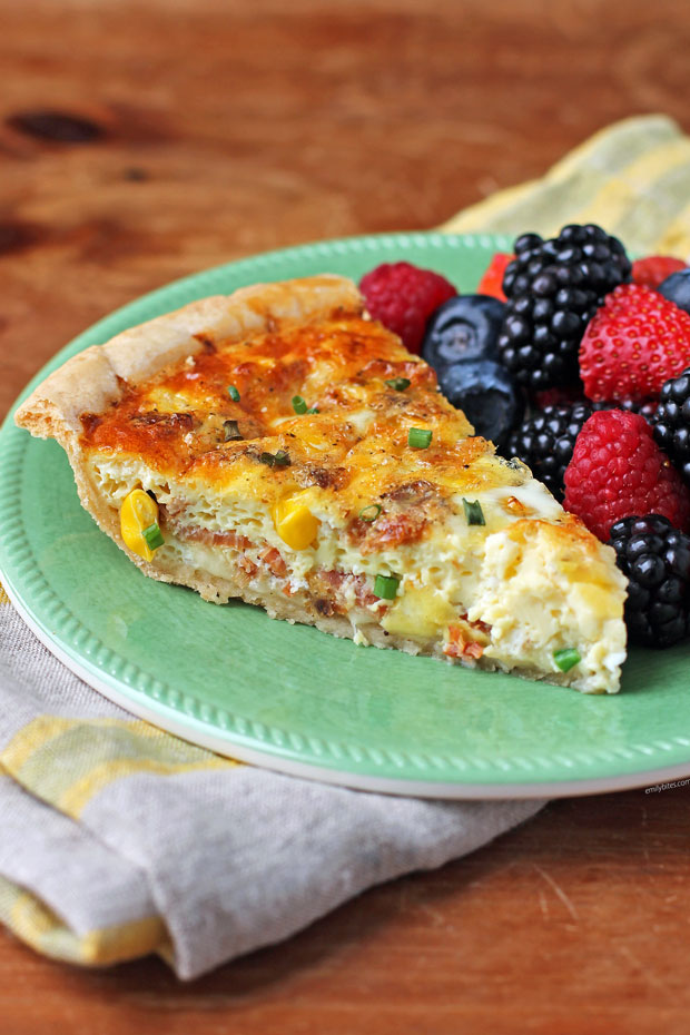 Bacon and Corn Quiche slice on a plate