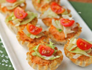 Taco Dip Bites lined up on a plate