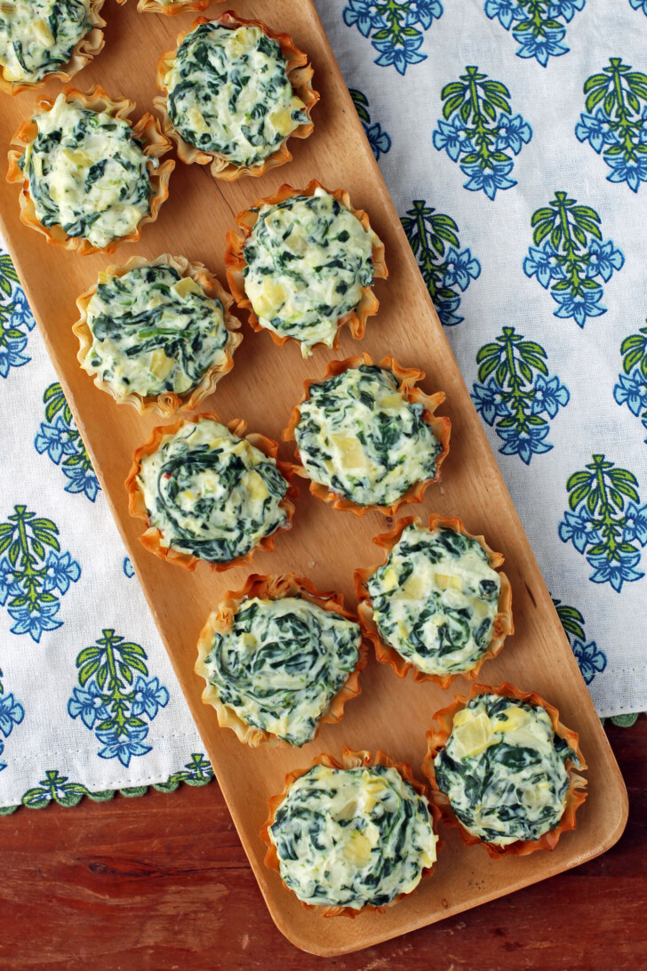 Spinach Artichoke Dip Tartlets overhead on a tray