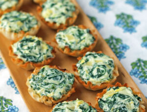 Spinach Artichoke Dip Tartlets on a serving tray