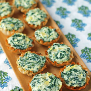 Spinach Artichoke Dip Tartlets on a tray