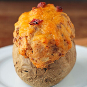 Bacon Cheeseburger Stuffed Twice Baked Potato on a plate