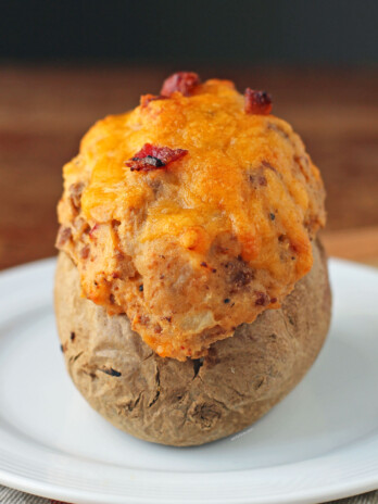 Bacon Cheeseburger Stuffed Twice Baked Potato on a plate
