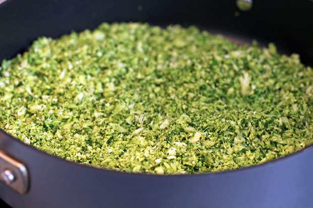 finely chopped broccoli in a skillet