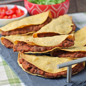 Baked Beef and Bean Tacos piled on a platter