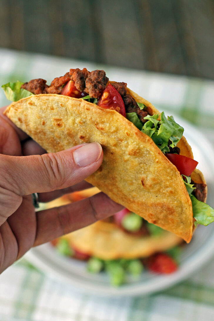 Baked Beef and Bean Taco in hand