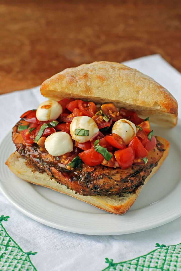 Bruschetta Chicken Sandwich open on a plate