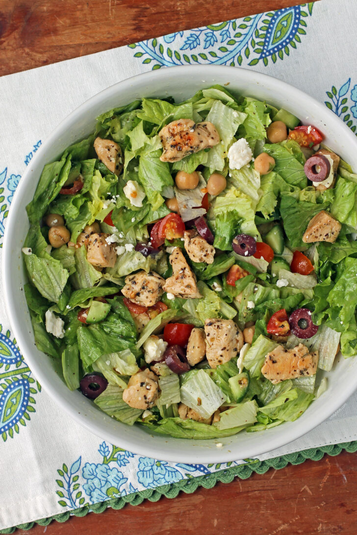 Mediterranean Chicken Chopped Salad mixed in a bowl