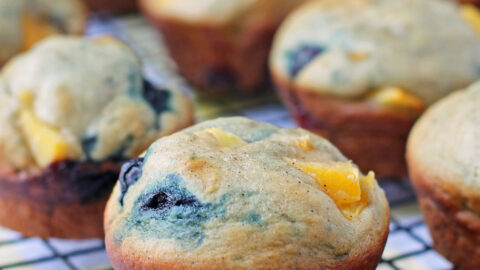 Peach Blueberry Muffins on a cooling rack
