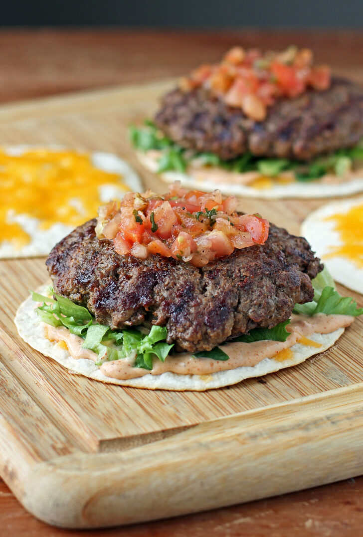 Quesadilla Burgers open on a cutting board