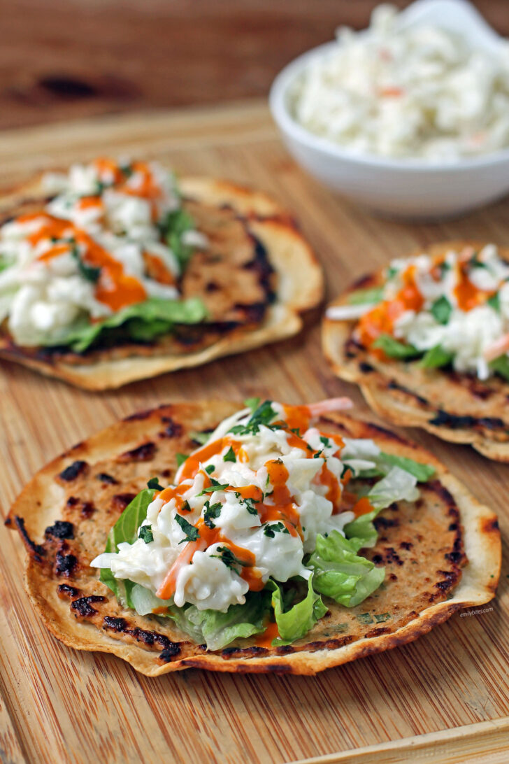 Buffalo Chicken Smashed Tacos close up on a cutting board